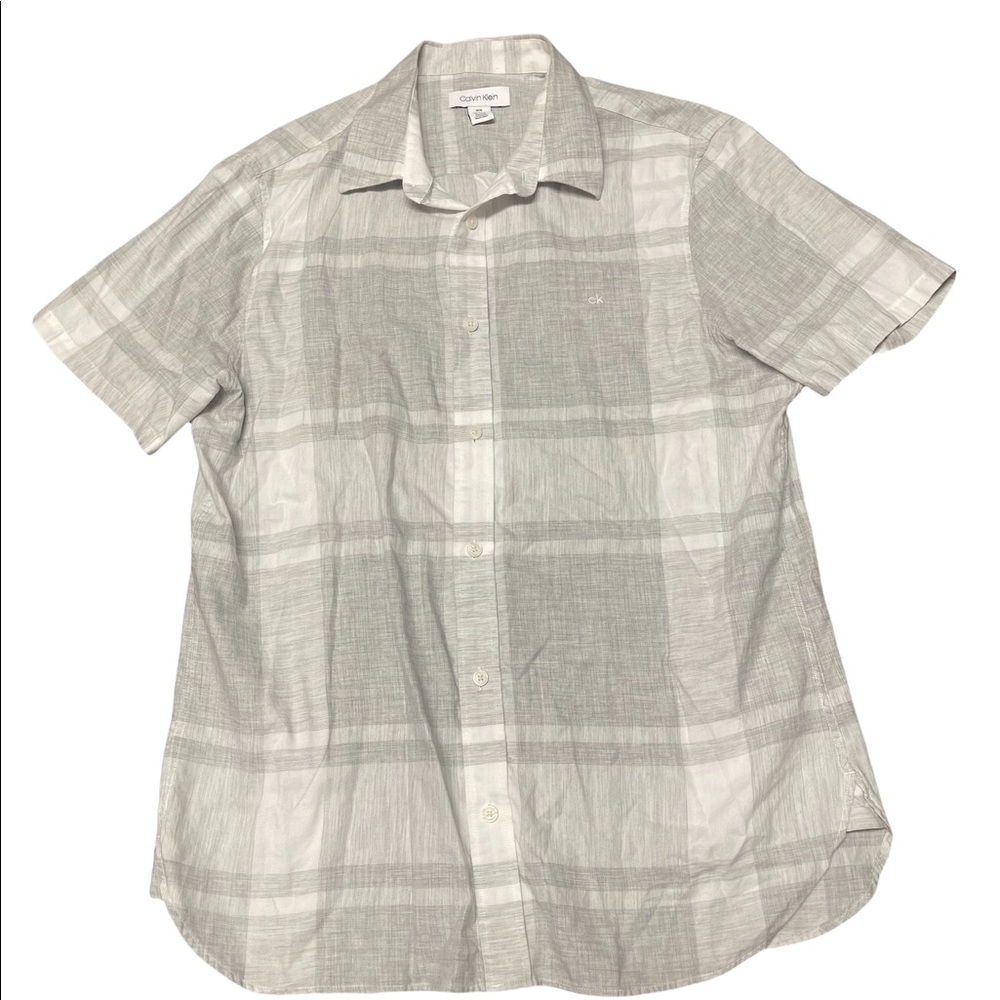 Calvin Klein button down shirt.      B2